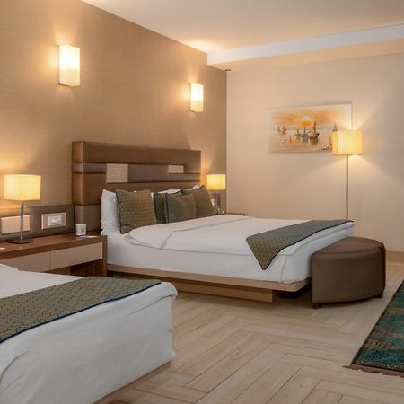 Titanic Hotel & Spa Sulaymaniyah Exterior foto A room at the hotel
