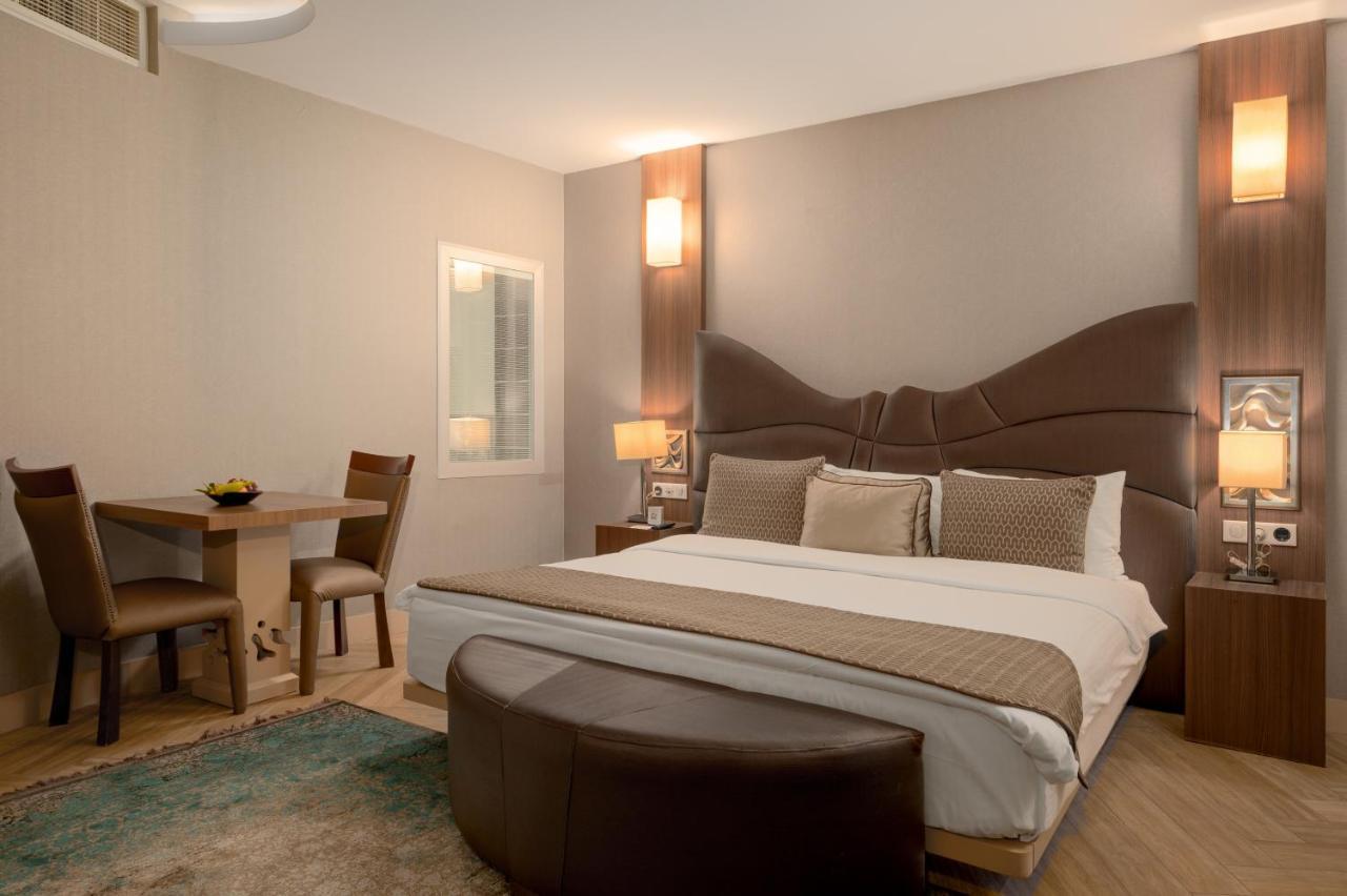 Titanic Hotel & Spa Sulaymaniyah Exterior foto A bedroom at the hotel