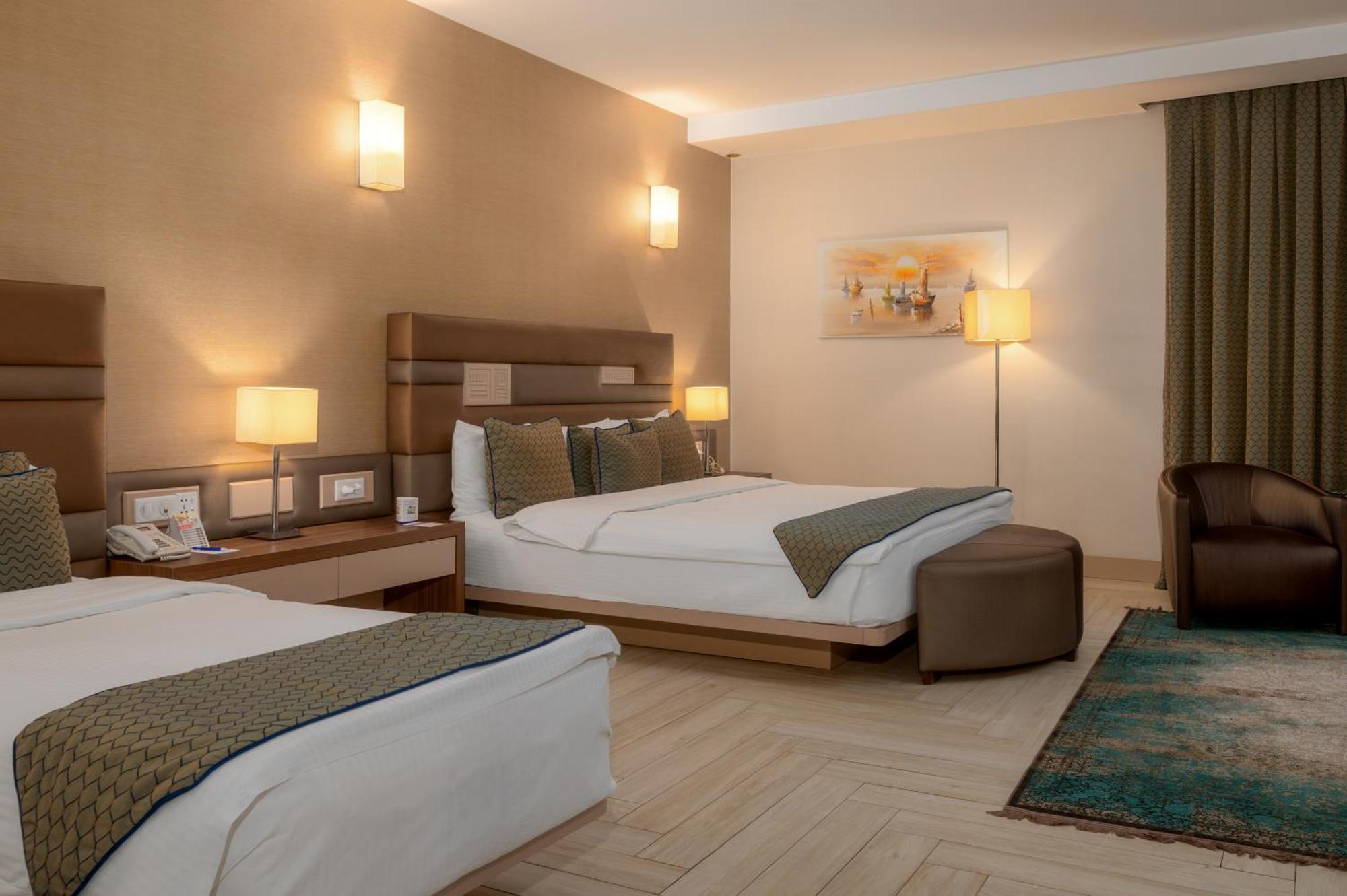 Titanic Hotel & Spa Sulaymaniyah Exterior foto A room at the hotel